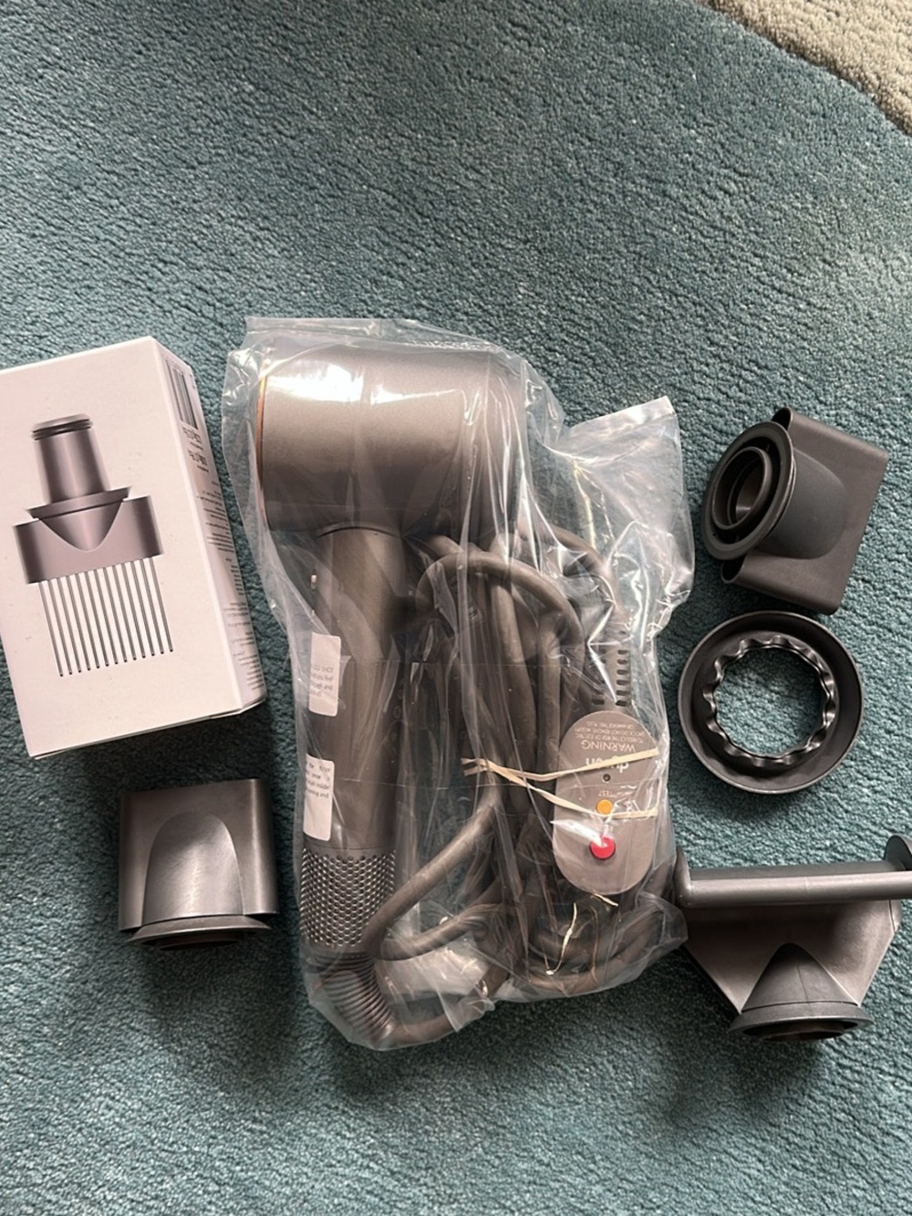 Refurbished Dyson Supersonic hair dryer with attachments